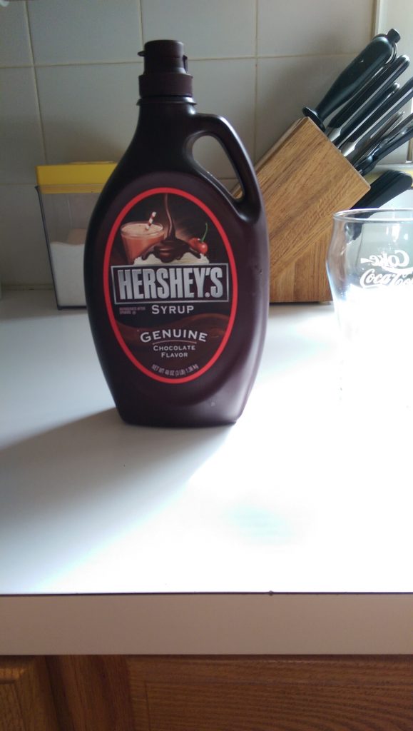 A bottle of Hershey's Chocolate Syrup